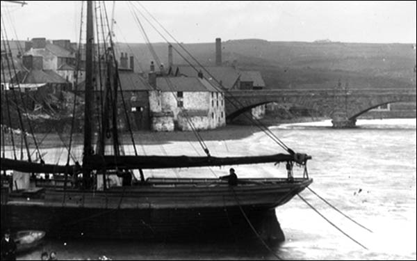 Photo of old corn warehouse and bridge circa 1895