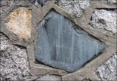 Photo of basalt stone in wall of Cornerstone building
