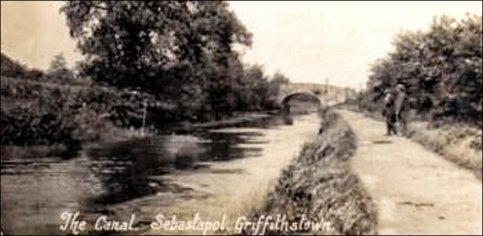 Photo of canal with original Bridge 46 in background
