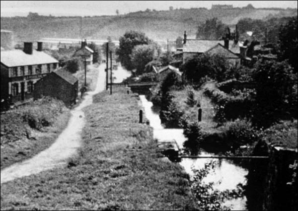 Old photo looking down the three locks at Pontnewydd
