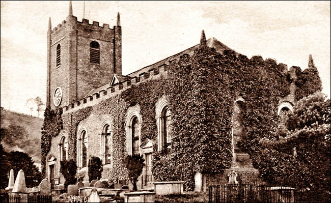 Old photo of Llanfyllin church with ivy-covered walls