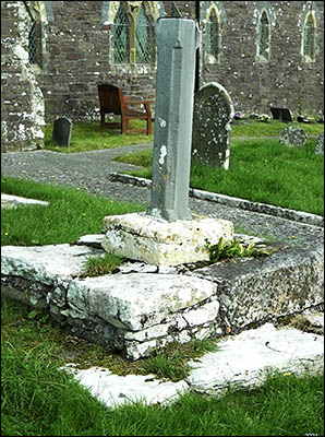 Photo of ancient cross base in Llansadwrnen churchyard