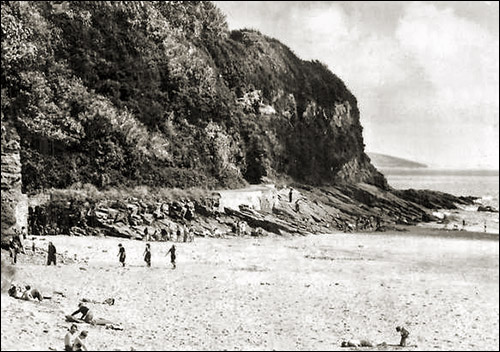 Old photo of Coppet Hall Point with tunnel in cliff