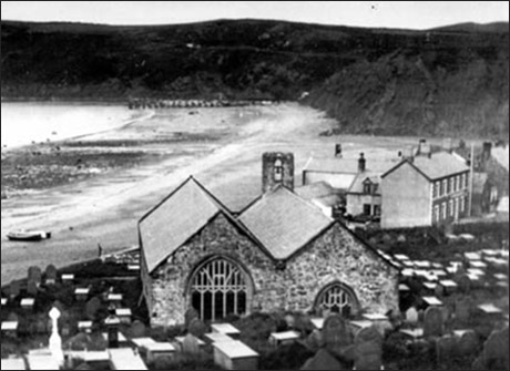 Old photo of Aberdaron beach including pier