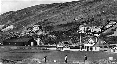 Old photo of Aberdyfi golf clubhouse and 1st tee