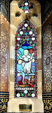 Photo of window and memorial to WH Owen in St Bartholomew's, Dublin