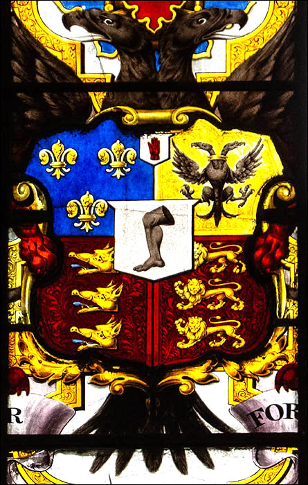 Photo of part of Glynllifon coat of arms showing black leg