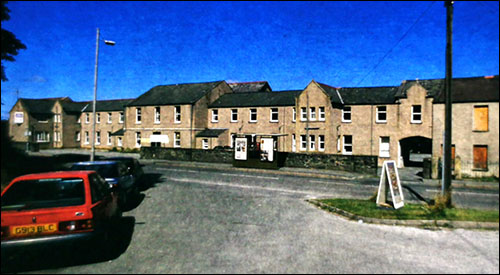 Photo of handaxes found at Coygan Cave Photo of Conwy hospital before demolition