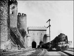Photo of train at tubular bridge