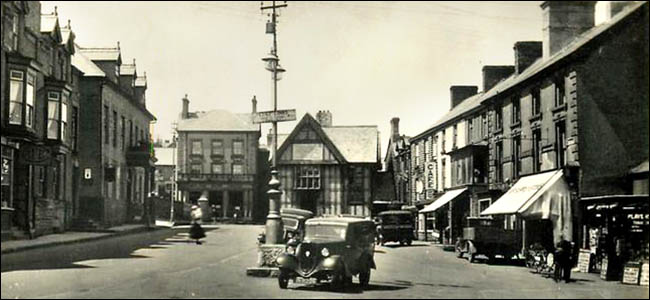 Old photo of Corwen square with bank building at far end