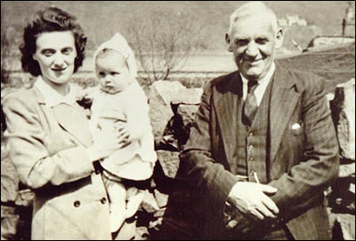 Photo of Johnnie Bryn Coch and wife Lucy with grandchild