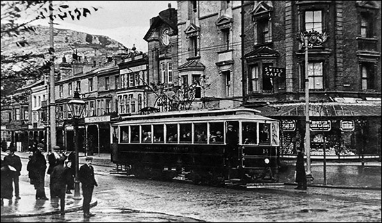 Old photo of tram in Mostyn Street, Llandudno