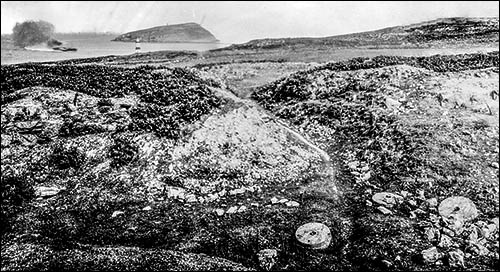 Old photo of millstone quarry at Penmon