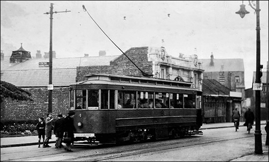 Photo of tramcar at tram stop outside Rhos Playhouse