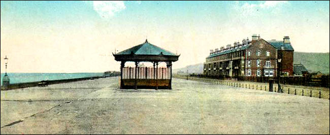 Old postcard of Tywyn prom and shelter