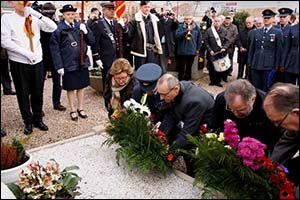 Photo of ceremony at RAF grave Marly