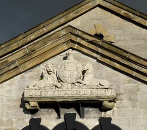 photo of royal coat of arms on court house